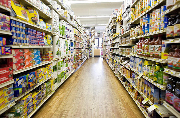 Thomas Hawk via Flickr / Via Flickr: thomashawk Grocery stores put more expensive items on the shelves we see first, so look up and down to spot the deals.
