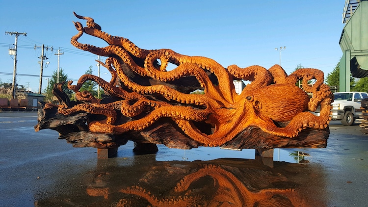 Chainsaw Artist Transforms A Discarded Redwood Stump Into A Giant Octopus Sculpture